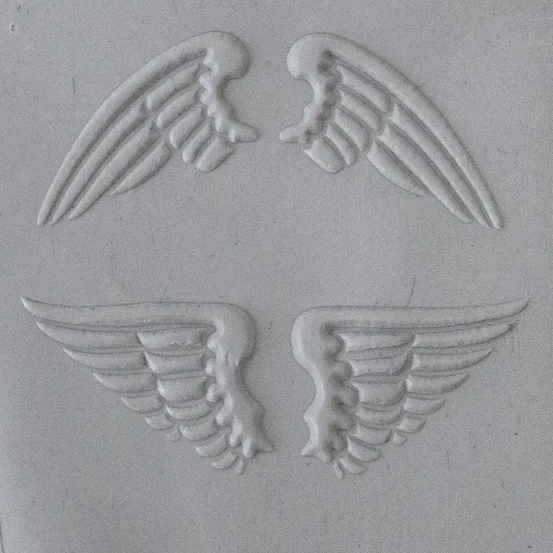 Embossed Natural Wing Texture Tile 1